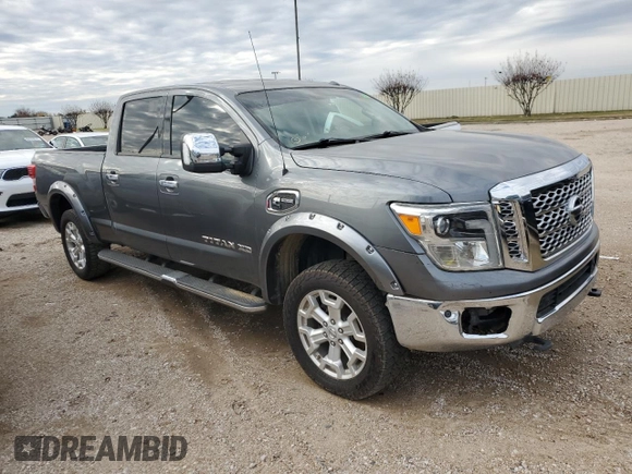 2016 Nissan Titan XD PRO-4X with VIN 1N6BA1F4XGN517824, listed as a Copart auction lot 83119324 with 150,310 mi miles and Clean Title. Bid and sale history available at carsss.com. Image 4.