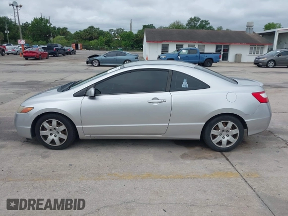 2006 Honda Civic Cpe LX with VIN 2HGFG12606H568106, listed as a IAAI auction lot 41983712 with 196,957 mi miles. Bid and sale history available at carsss.com. Image 14.