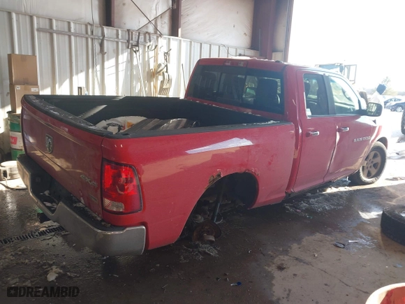 2011 Ram 1500 SLT with VIN 1D7RV1GP5BS535971, listed as a IAAI auction lot 41236443 with 185,641 mi miles. Bid and sale history available at carsss.com. Image 4.