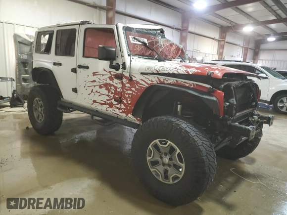 2017 Jeep Wrangler Unlimited Rubicon Recon with VIN 1C4BJWFG3HL577788, listed as a Copart auction lot 82932034 with 142,752 mi miles and Salvage title. Bid and sale history available at DreamBid. Image 4.