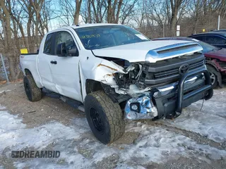 2014 Toyota Tundra 4WD Truck SR with VIN 5TFUY5F1XEX389686, listed as a IAAI auction lot 41381839 with 153,831 mi miles. Bid and sale history available at carsss.com. Image 1.
