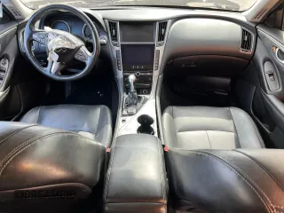 2015 Infiniti Q50 Premium with VIN JN1BV7AP8FM343934, listed as a Copart auction lot 46954845 with 168,593 mi miles and Salvage Title. Bid and sale history available at DreamBid. Image 8.