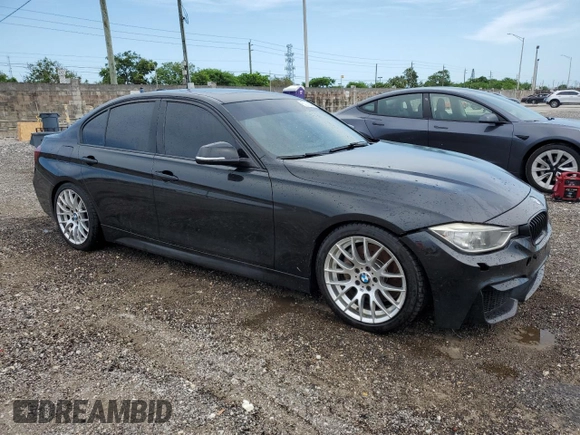 2014 BMW 3 Series 335i xDrive with VIN WBA3B9G53ENR92266, listed as a Copart auction lot 58800785 with 148,565 mi miles and Clean title. Bid and sale history available at DreamBid. Image 4.