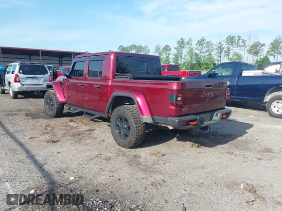 2021 Jeep Gladiator Mojave with VIN 1C6JJTEG8ML592381, listed as a IAAI auction lot 42369581 with 75,295 mi miles and . Bid and sale history available at DreamBid. Image 3.