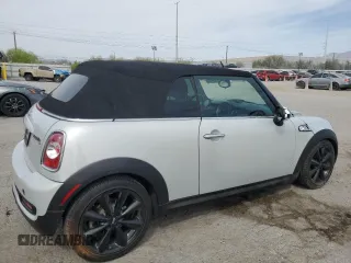 2014 MINI Convertible S with VIN WMWZP3C53ET707205, listed as a Copart auction lot 52179175 with 101,209 mi miles and Salvage Title. Bid and sale history available at DreamBid. Image 3.