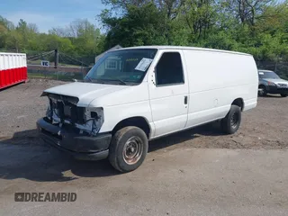 2014 Ford Econoline Cargo Commercial with VIN 1FTNS2EW2EDA83939, listed as a IAAI auction lot 42159453 with 148,947 mi miles. Bid and sale history available at carsss.com. Image 22.
