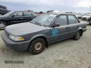 1991 Toyota Corolla z VIN 1NXAE94A0MZ186484, wystawiony jako Copart lot #76421584 z przebiegiem 201 018 mil mil oraz Czysty tytuł • Clean title. Historia ofert i sprzedaży dostępna na DreamBid. Obrazek 1.