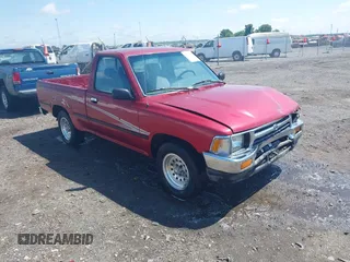 1992 Toyota Pickup DLX z VIN 4TARN81P4NZ002559, wystawiony jako IAAI lot #42230656 z przebiegiem 108 044 mil mil oraz . Historia ofert i sprzedaży dostępna na DreamBid. Obrazek 1.