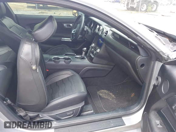 2021 Ford Mustang EcoBoost z VIN 1FA6P8TH1M5121107, wystawiony jako IAAI lot #42204097 z przebiegiem 51 542 mil mil oraz . Historia ofert i sprzedaży dostępna na DreamBid. Obrazek 5.