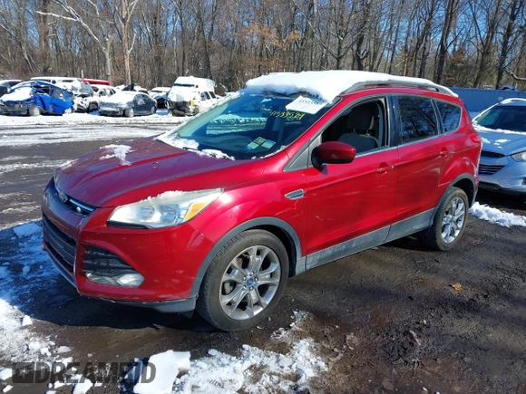 2014 Ford Escape SE with VIN 1FMCU0GX6EUA57609, listed as a IAAI auction lot 41533589 with 96,709 mi miles. Bid and sale history available at carsss.com. Image 2.