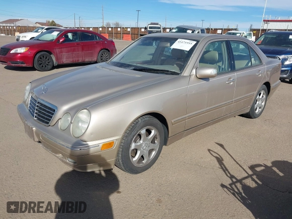 2002 Mercedes-Benz E-Class with VIN WDBJF65J92B479841, listed as a IAAI auction lot 41471955 with 203,527 mi miles. Bid and sale history available at carsss.com. Image 2.
