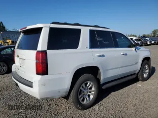 2020 Chevrolet Tahoe LT z VIN 1GNSKBKC5LR243378, wystawiony jako Copart lot #52690775 z przebiegiem 79 900 mil mil oraz Szkoda całkowita • Salvage title. Historia ofert i sprzedaży dostępna na DreamBid. Obrazek 3.