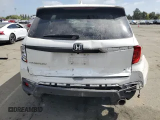 2022 Honda Passport EX-L with VIN 5FNYF7H57NB005568, listed as a Copart auction lot 54406795 with 25,681 mi miles and Salvage title. Bid and sale history available at DreamBid. Image 6.