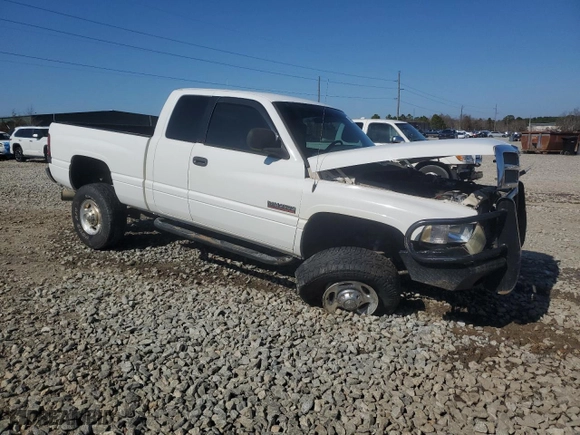 2002 Dodge Ram 2500 with VIN 3B7KF23662M255383, listed as a Copart auction lot 43199645 with 117,720 mi miles and Salvage Title. Bid and sale history available at carsss.com. Image 4.