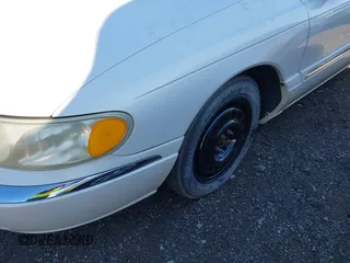 2002 Lincoln Continental with VIN 1LNHM97V92Y678663, listed as a IAAI auction lot 41777625 with 173,329 mi miles and . Bid and sale history available at DreamBid. Image 6.