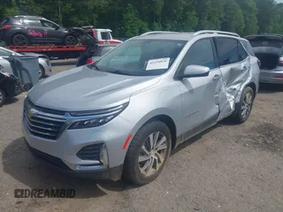 2022 Chevrolet Equinox Premier z VIN 2GNAXXEVXN6146327, wystawiony jako IAAI lot #42294870 z przebiegiem 68 276 mil mil oraz . Historia ofert i sprzedaży dostępna na DreamBid. Obrazek 2.