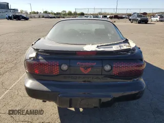 2001 Pontiac Firebird Firebird z VIN 2G2FS22K412122783, wystawiony jako Copart lot #73865114 z przebiegiem 131 320 mil mil oraz Szkoda całkowita • Salvage title. Historia ofert i sprzedaży dostępna na DreamBid. Obrazek 6.
