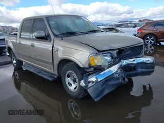 2003 Ford F-150 XLT with VIN 1FTRW07L53KD82167, listed as a IAAI auction lot 41745801 with 216,783 mi miles. Bid and sale history available at carsss.com. Image 1.