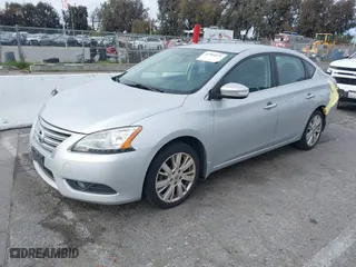 2015 Nissan Sentra S with VIN 3N1AB7AP3FY282767, listed as a IAAI auction lot 41904576 with 162,210 mi miles. Bid and sale history available at carsss.com. Image 2.