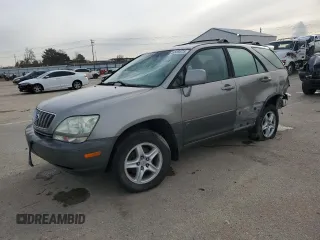 2001 Lexus RX 300 z VIN JTJHF10U610214581, wystawiony jako Copart lot #54184655 z przebiegiem 221 293 mil mil oraz Szkoda całkowita • Salvage title. Historia ofert i sprzedaży dostępna na DreamBid. Obrazek 1.