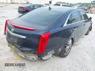 2013 Cadillac XTS Premium with VIN 2G61S5S31D9196354, listed as a IAAI auction lot 41905983 with 197,605 mi miles. Bid and sale history available at carsss.com. Image 4.