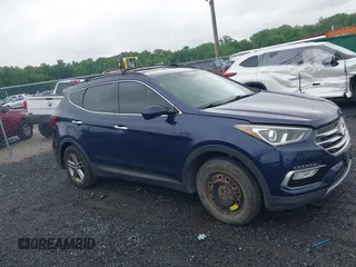 2017 Hyundai Santa Fe 2.4L z VIN 5XYZU3LB7HG418300, wystawiony jako IAAI lot #42369329 z przebiegiem 126 326 mil mil oraz . Historia ofert i sprzedaży dostępna na DreamBid. Obrazek 13.