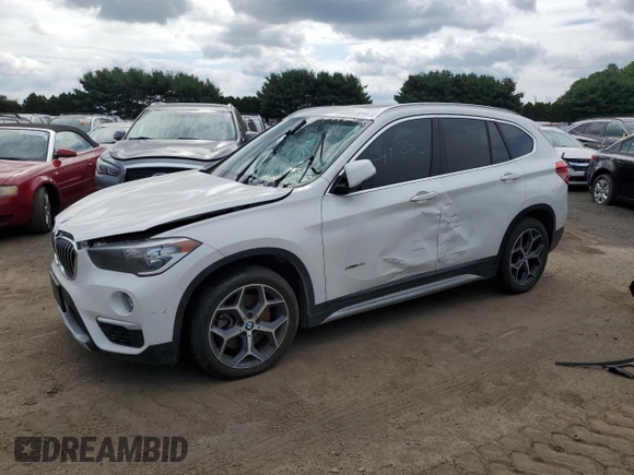 2018 BMW X1 xDrive28i z VIN WBXHT3C39J5F91943, wystawiony jako Copart lot #63497885 z przebiegiem 88 002 mil mil oraz Czysty tytuł • Clean title. Historia ofert i sprzedaży dostępna na DreamBid. Obrazek 1.