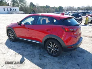 2016 Mazda CX-3 Grand Touring with VIN JM1DKFD72G0129096, listed as a IAAI auction lot 41592893 with 144,860 mi miles. Bid and sale history available at carsss.com. Image 3.