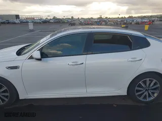2019 Kia Optima EX with VIN 5XXGU4L14KG302388, listed as a IAAI auction lot 40636313 with 135,095 mi miles. Bid and sale history available at carsss.com. Image 13.