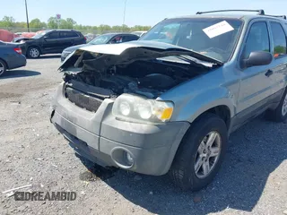 2005 Ford Escape Hybrid z VIN 1FMCU96HX5KC07151, wystawiony jako IAAI lot #42093744 z przebiegiem 275 661 mil mil oraz . Historia ofert i sprzedaży dostępna na DreamBid. Obrazek 6.