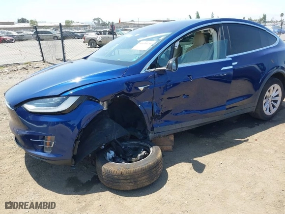 2017 Tesla Model X 90D with VIN 5YJXCBE24HF044656, listed as a IAAI auction lot 40054420 with 137,621 mi miles. Bid and sale history available at carsss.com. Image 6.
