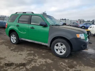 2010 Ford Escape Hybrid with VIN 1FMCU4K30AKC90709, listed as a Copart auction lot 85394774 with 183,092 mi miles and Salvage title. Bid and sale history available at DreamBid. Image 4.