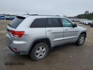 2012 Jeep Grand Cherokee Laredo with VIN 1C4RJFAG2CC294202, listed as a Copart auction lot 44918715 with 104,605 mi miles and Salvage Title. Bid and sale history available at carsss.com. Image 3.