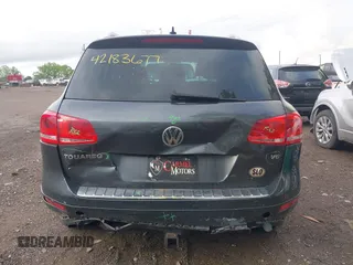 2014 Volkswagen Touareg Sport z VIN WVGEF9BP6ED007632, wystawiony jako IAAI lot #42183677 z przebiegiem 166 245 mil mil oraz . Historia ofert i sprzedaży dostępna na DreamBid. Obrazek 16.