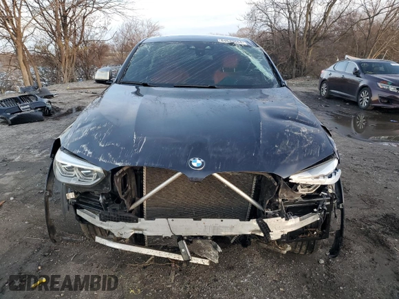 2019 BMW X4 M40i z VIN 5UXUJ5C5XKLA93583, wystawiony jako Copart lot #84643664 z przebiegiem Nie podano mil oraz Szkoda całkowita • Salvage title. Historia ofert i sprzedaży dostępna na DreamBid. Obrazek 5.