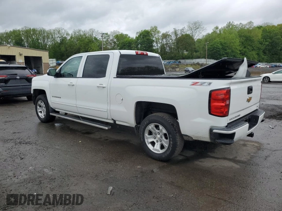 2016 Chevrolet Silverado 1500 LT with VIN 3GCUKREC1GG341223, listed as a Copart auction lot 56547195 with 180,189 mi miles and Salvage Title. Bid and sale history available at DreamBid. Image 2.