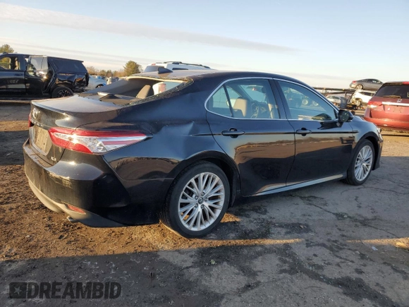 2019 Toyota Camry LE with VIN 4T1B11HK1KU728774, listed as a Copart auction lot 48239275 with 55,293 mi miles and Salvage Title. Bid and sale history available at carsss.com. Image 3.