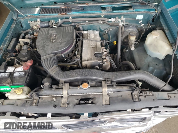1997 Nissan Frontier XE with VIN 1N6SD16SXVC346717, listed as a Copart auction lot 55442215 with 112,343 mi miles and Salvage title. Bid and sale history available at DreamBid. Image 11.