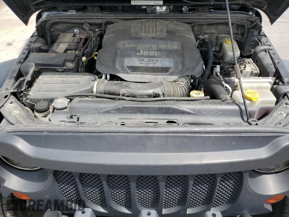2013 Jeep Wrangler Unlimited Sport with VIN 1C4BJWDG0DL560265, listed as a Copart auction lot 58444045 with 111,354 mi miles and Salvage title. Bid and sale history available at DreamBid. Image 12.