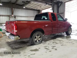 2000 Ford F-150 XL with VIN 1FTZX1720YKB22051, listed as a Copart auction lot 88255005 with 243,759 mi miles and Salvage Title. Bid and sale history available at carsss.com. Image 3.