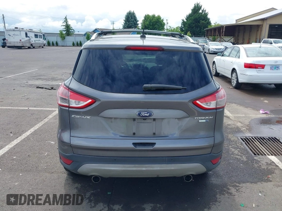 2013 Ford Escape Titanium with VIN 1FMCU9J95DUC95061, listed as a IAAI auction lot 42293047 with 124,641 mi miles and . Bid and sale history available at DreamBid. Image 17.