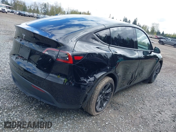 2024 Tesla Model Y with VIN 7SAYGDED3RF119101, listed as a IAAI auction lot 42019817 with 35,714 mi miles and . Bid and sale history available at DreamBid. Image 4.