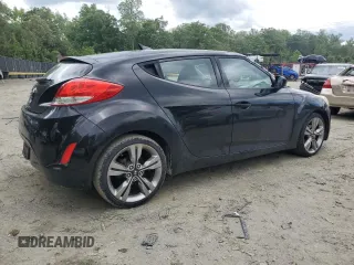 2013 Hyundai Veloster w/Gray Int z VIN KMHTC6AD2DU106887, wystawiony jako Copart lot #58149635 z przebiegiem 159 914 mil mil oraz Szkoda całkowita • Salvage title. Historia ofert i sprzedaży dostępna na DreamBid. Obrazek 3.