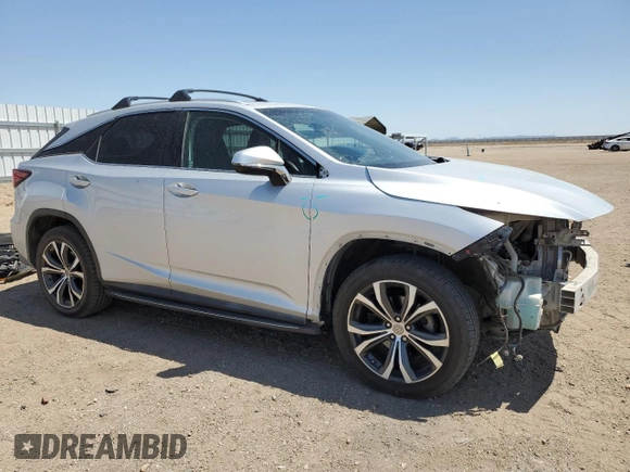 2016 Lexus RX 350 with VIN 2T2ZZMCA8GC016032, listed as a Copart auction lot 58400605 with 142,878 mi miles and Salvage title. Bid and sale history available at DreamBid. Image 4.