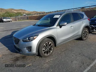2016 Mazda CX-5 Grand Touring z VIN JM3KE2DY8G0709573, wystawiony jako IAAI lot #42021005 z przebiegiem 113 941 mil mil oraz . Historia ofert i sprzedaży dostępna na DreamBid. Obrazek 18.