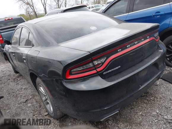 2015 Dodge Charger SE with VIN 2C3CDXBG7FH841469, listed as a IAAI auction lot 42001599 with 103,342 mi miles and . Bid and sale history available at DreamBid. Image 3.