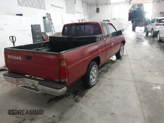 1997 Nissan Frontier XE with VIN 1N6SD16SXVC362299, listed as a IAAI auction lot 41941202 with 244,729 mi miles and . Bid and sale history available at DreamBid. Image 4.