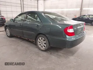 2004 Toyota Camry LE with VIN 4T1BE32K04U361670, listed as a IAAI auction lot 42139994 with 205,899 mi miles. Bid and sale history available at carsss.com. Image 3.