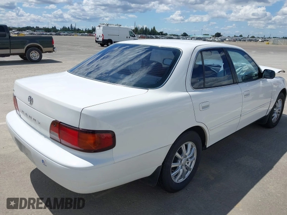1996 Toyota Camry DX z VIN JT2BG12K8T0368612, wystawiony jako IAAI lot #42248750 z przebiegiem 122 237 mil mil oraz . Historia ofert i sprzedaży dostępna na DreamBid. Obrazek 4.