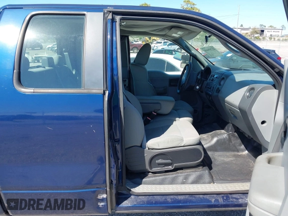 2007 Ford F-150 STX with VIN 1FTRX12W27NA23724, listed as a IAAI auction lot 41789668 with 255,067 mi miles and . Bid and sale history available at DreamBid. Image 5.